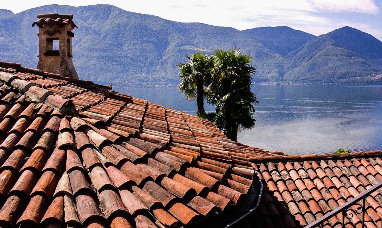 Views across Swiss / Italian roofs to Lago Maggiore